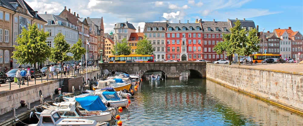 Urban landscape of Copenhagen, Denmark, highlighting its historic architecture and canals, a leading European destination in sustainability and education.